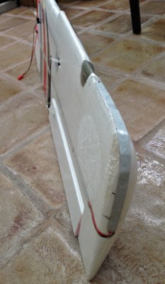 Forward corner of the left wring with red LEDs