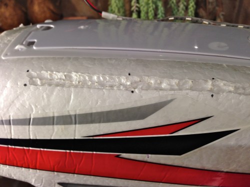 Etching out a groove using a soldering iron and a metal rule