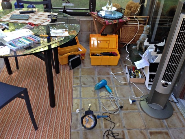 The author being relegated to a makeshift workshop due to burning smell