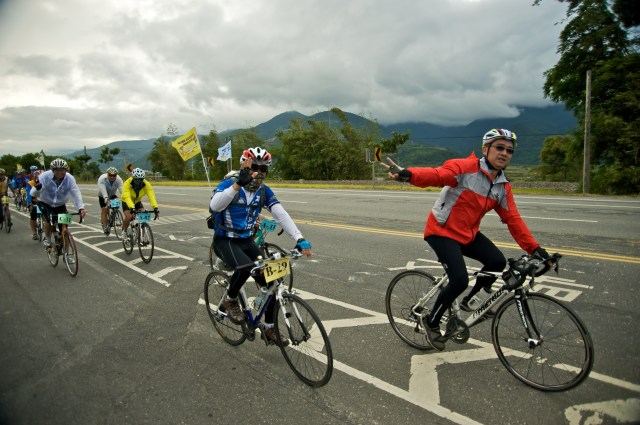 Bicyclists tour through the FuLi Town