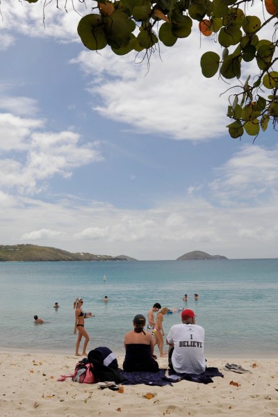 Another waitress bringing refreshment to visitors