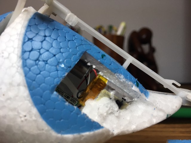 The lip was wedged firmly between foam for CG stability