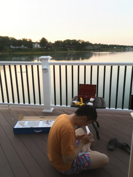 Repairing the plane - brushing off sand from gears