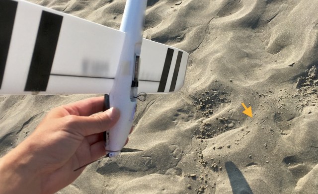 Minimum amount of sand disturbed by landing