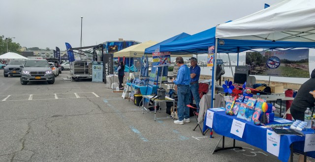 Setting up HHAMS tent at HarborFest 2019