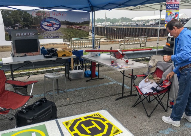 Taping paintball poster to the HHAMS tent