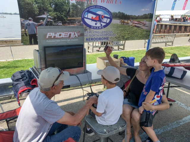 Kids learn to fly model airplanes