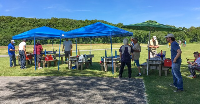 Pilots take a break under the shade
