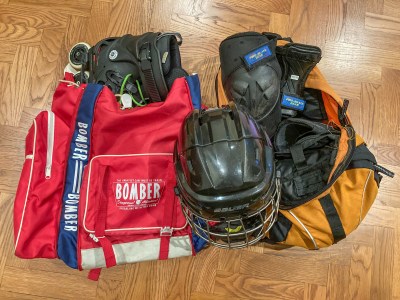 Street hockey equipment in backpacks