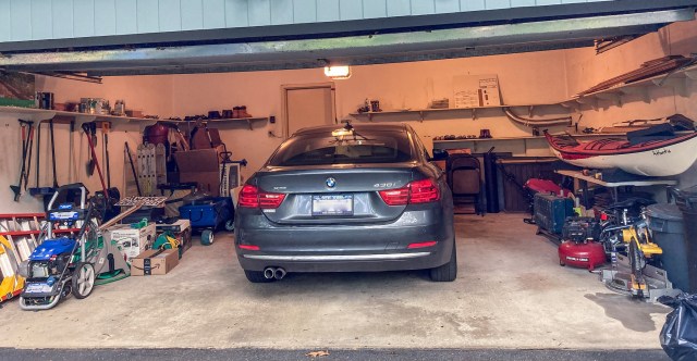 Garage before remodeling with tools and stuff strewn about