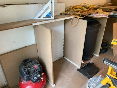 Trash cans have their own designated cabinet spaces