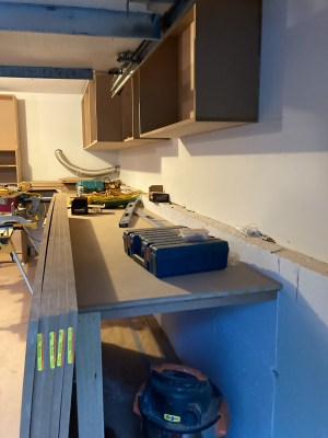 Kayak tabletop doubles as storage for tall ladders