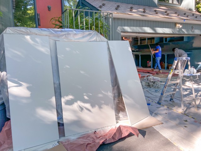 Final coat of paint on sliding doors