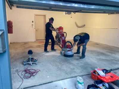 Diamond-sanding the concrete floor
