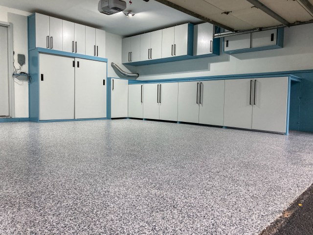 Finished look of the epoxy floor with new cabinets in the background