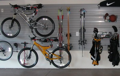 Slatwall in garage for bikes, skis, and golf clubs