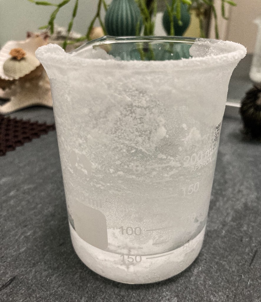 salt creep: Salt colony thriving on the outer wall of the cylinder