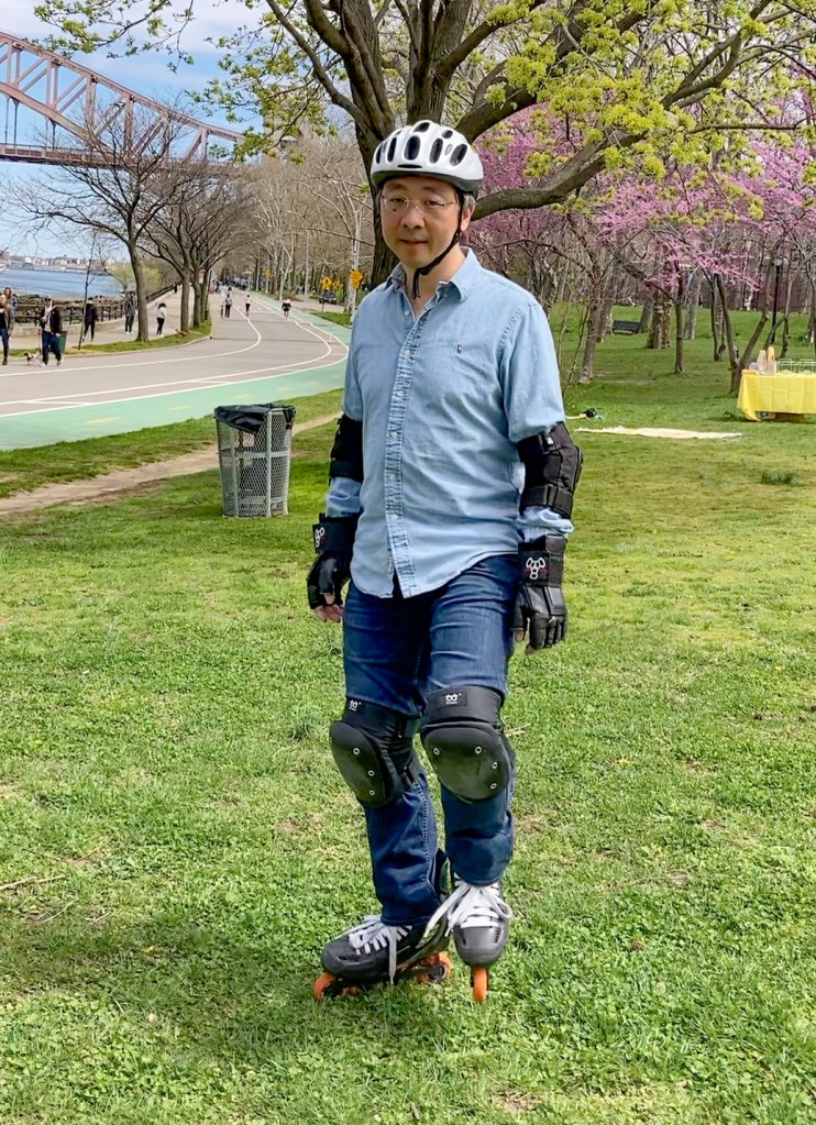 Practicing V steps on grass on inline skates
