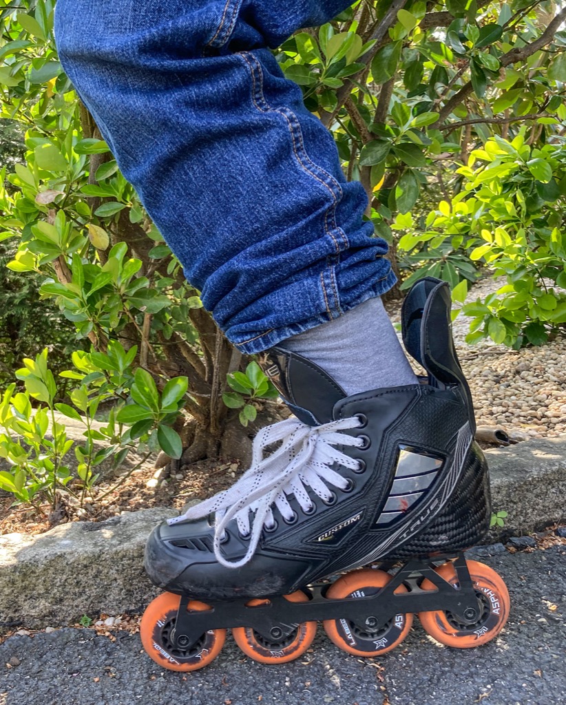 Hockey inline skates have monocoque shells reinforced with carbon fiber. Carbon fiber shells hug my feet and provide excellent support for my shins and ankles. They allow me to bend my ankles forward, while they continue to provide snug support from sides. 