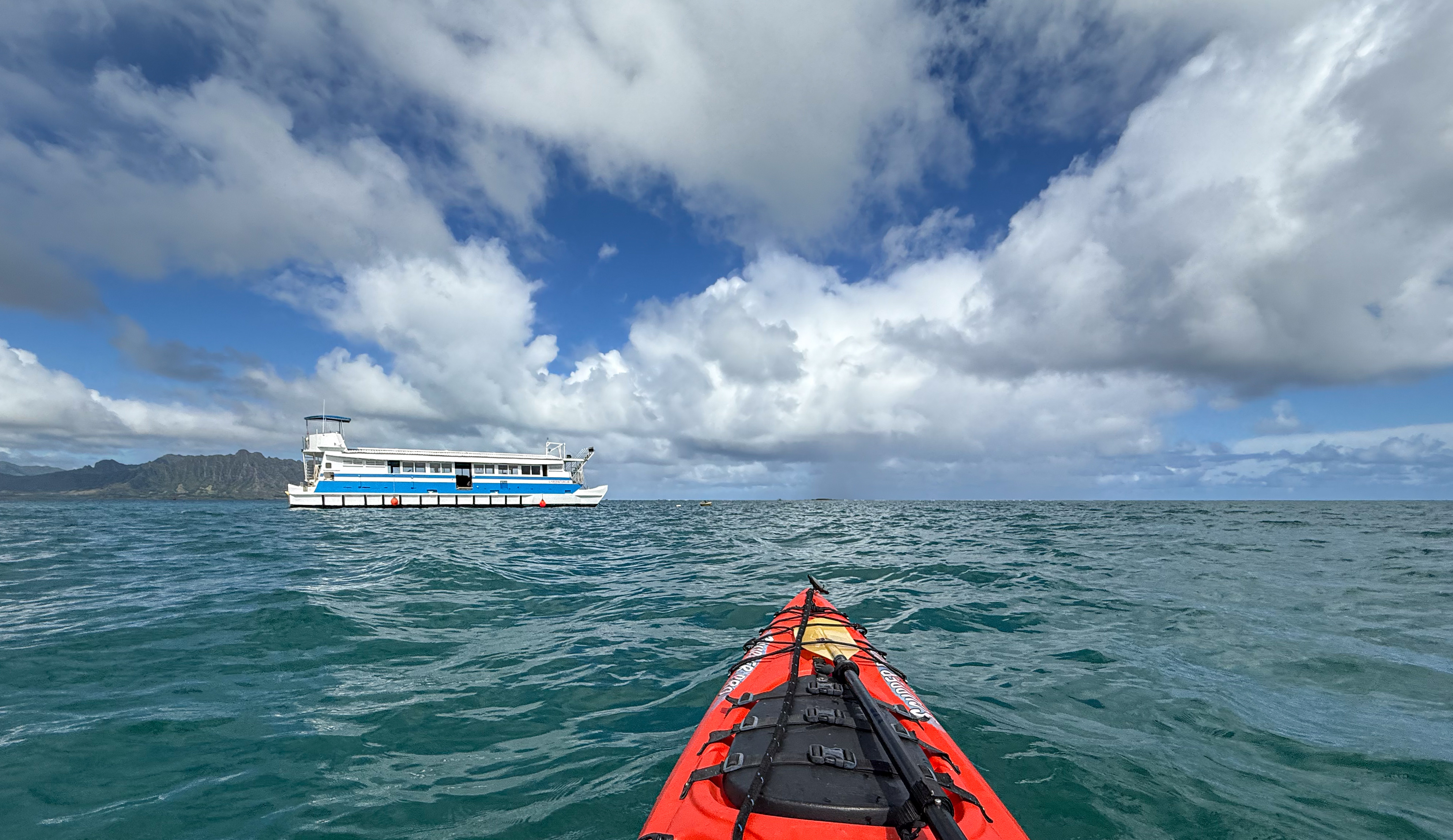 The last moored boat I saw before kayaking along into the ocean