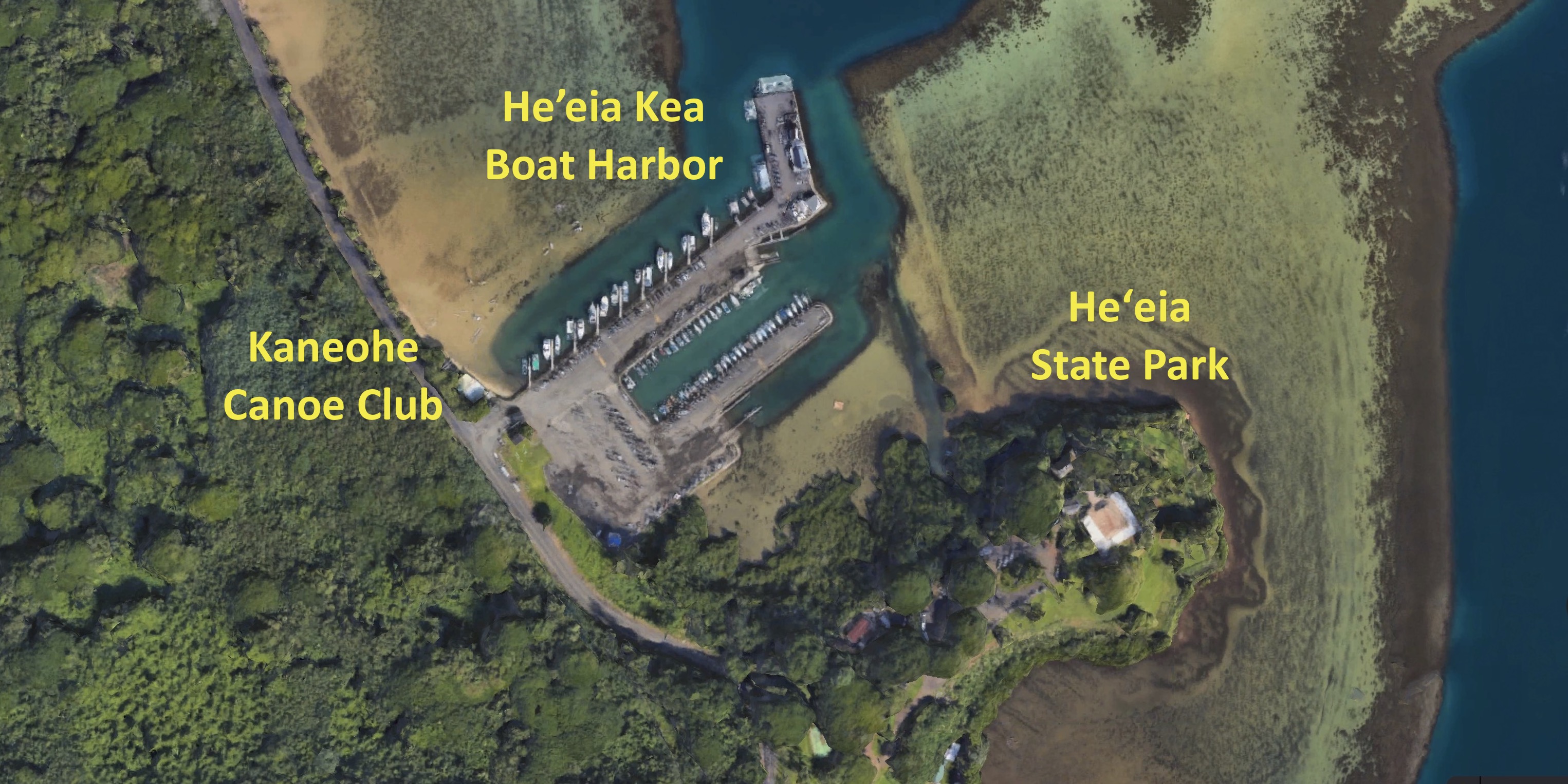 Aerial view of Kaneohe Outrigger Canoe Club, He’eia Kea Boat Harbor, and Heʻeia State Park